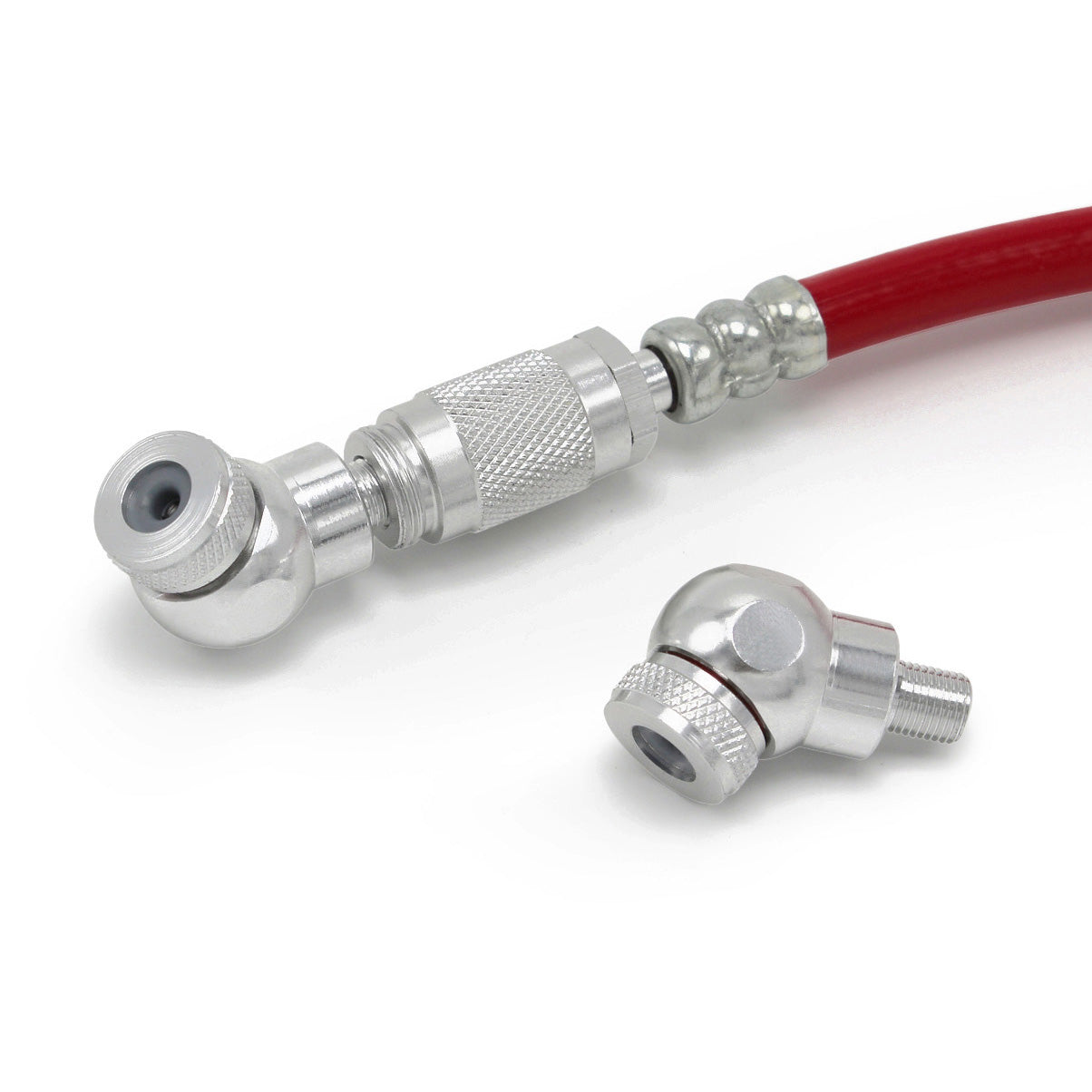 Close-up of a red hose with Prestacycle Angle Mini Presta Head and Urethane Elastomer Gasket attached, plus a matching metal fitting—ideal for inflating tubeless tires.