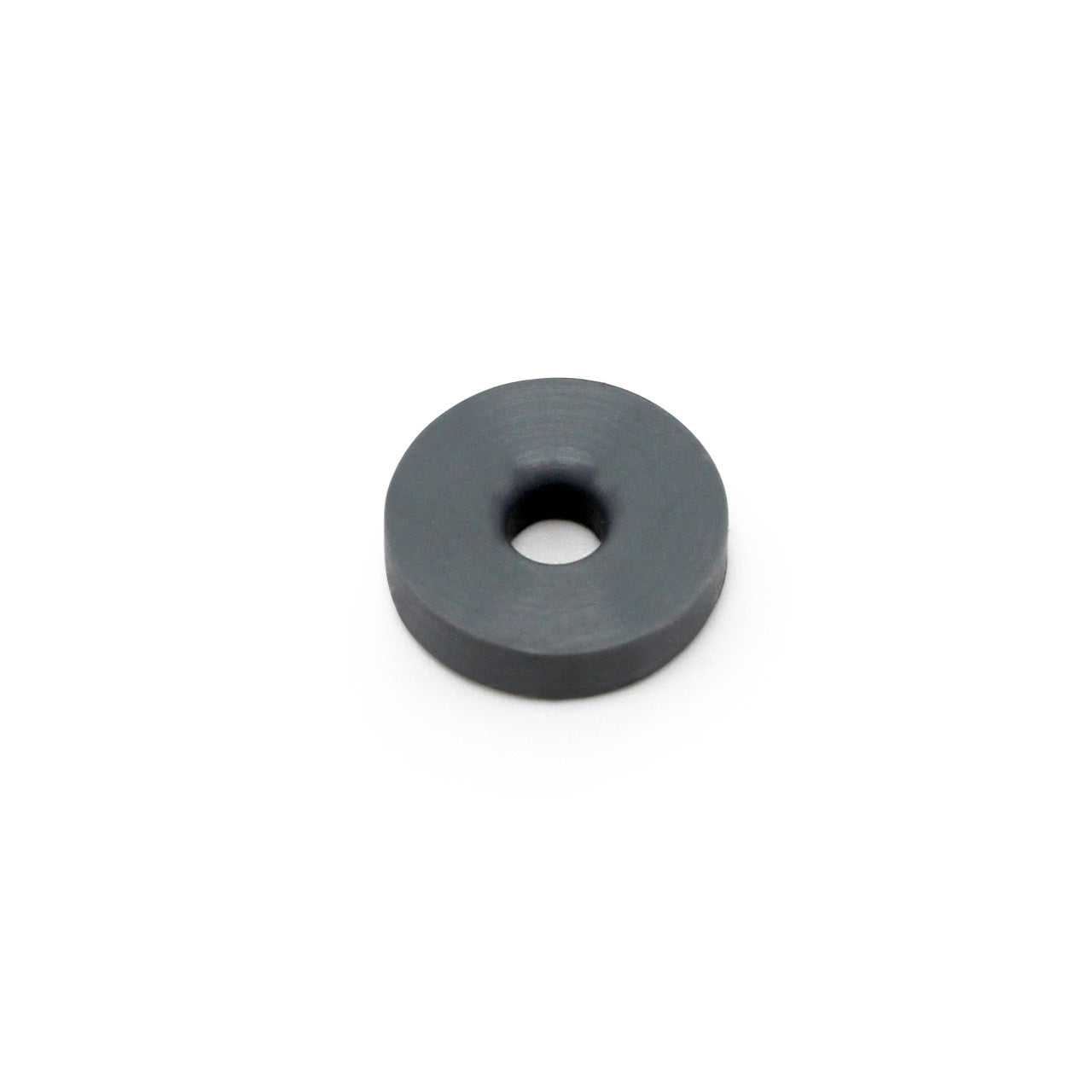 The Prestacycle Prestaflator Mini Presta Head Gasket is a small, flat, round black disc with a center hole, shown on a white background. This component ensures Presta valve compatibility for the Prestaflator MINI.