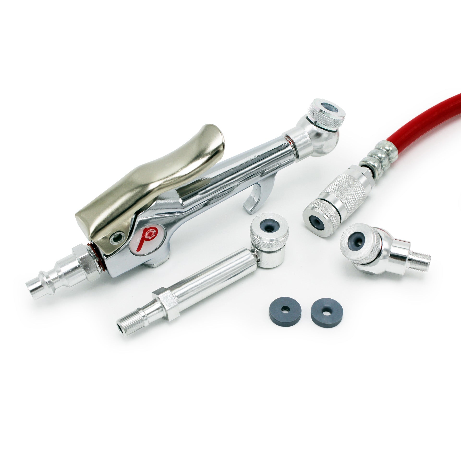 The Prestacycle Prestaflator Mini Presta Head Gasket kit includes a metal air blow gun with a red hose, two extra nozzles, two rubber washers, a Presta valve head gasket, and a quick-connect fitting—all displayed on a white background.