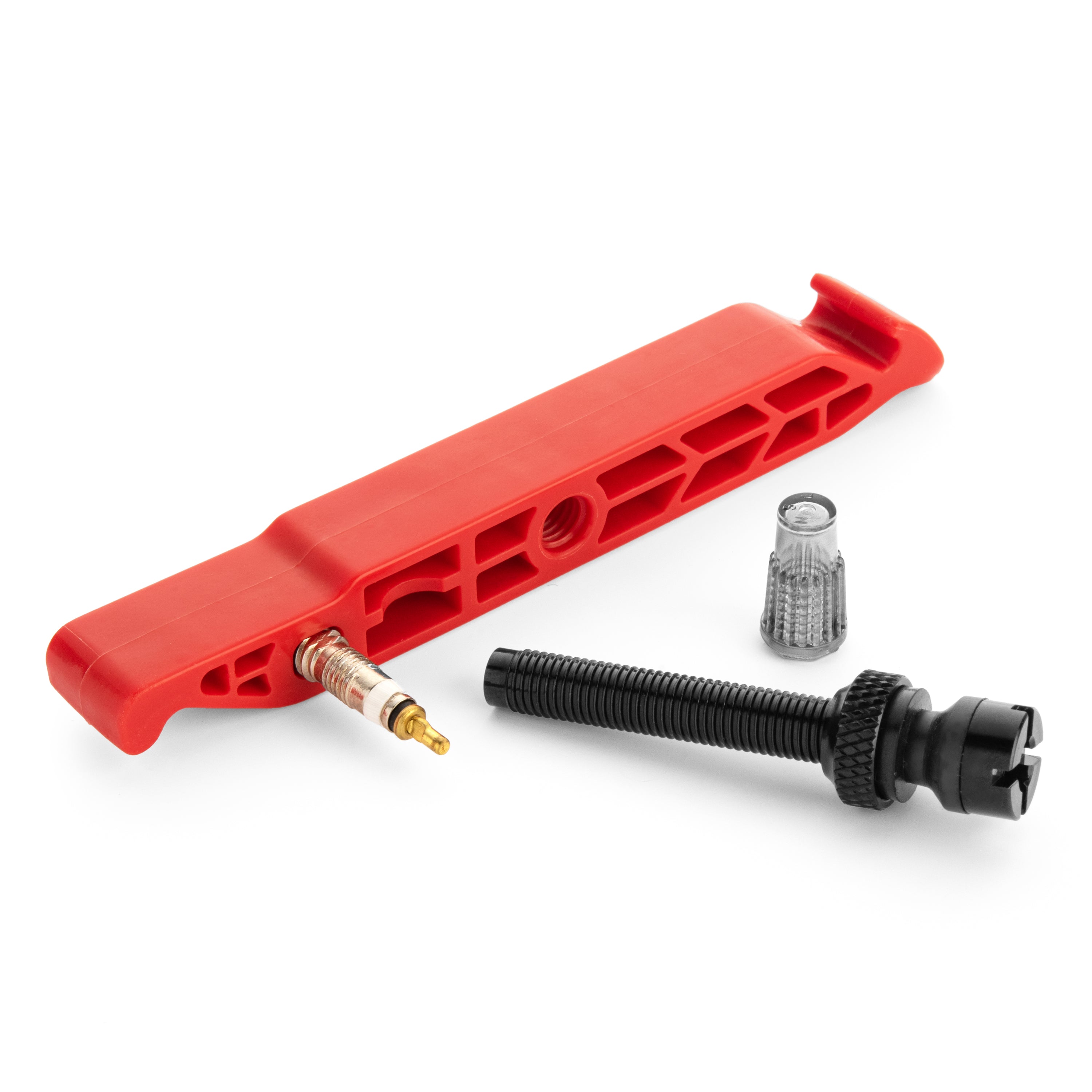 The Prestacycle Prestalever GO 5-in-1 multi-tool tire lever, with included Presta valve core tool, cap, black Presta valve, and locking nut, is arranged on a white background.