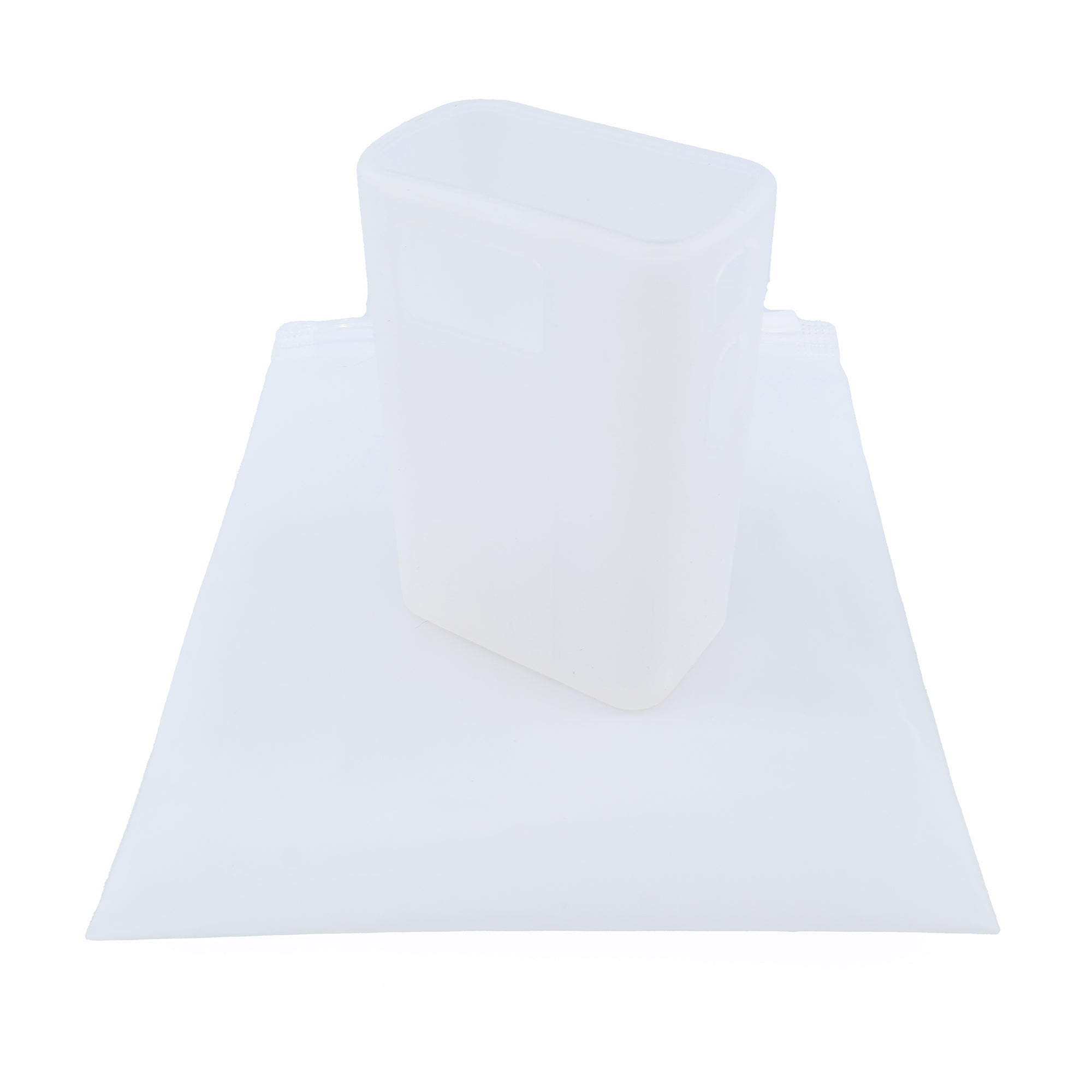 A white Prestaflator GO Silicone Case by Prestacycle, designed as a reusable rectangular accessory, stands upright on a similar silicone pouch—both custom-fit cases for protecting your kitchen or cycling essentials.