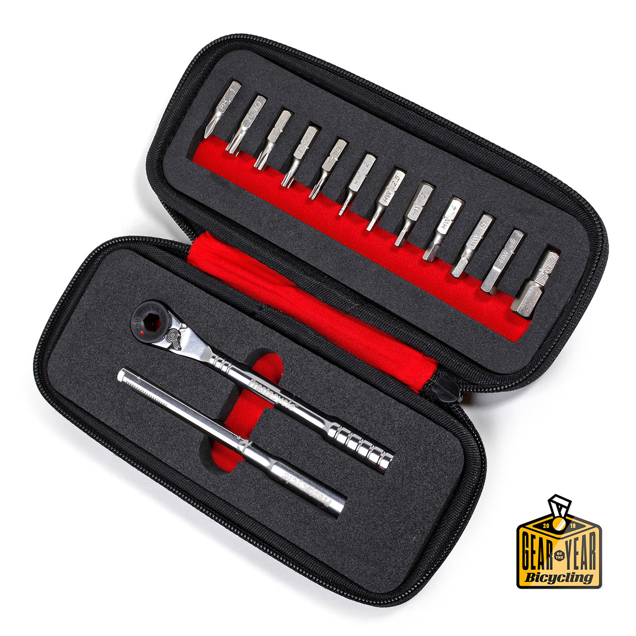 The Prestacycle T-Handle Ratchet Deluxe Kit by Prestacycle features a compact set with multiple screwdriver bits, a 3-way ratchet, and an extension bar in a black and red zippered case—winner of the “Gear of the Year Bicycling” award.