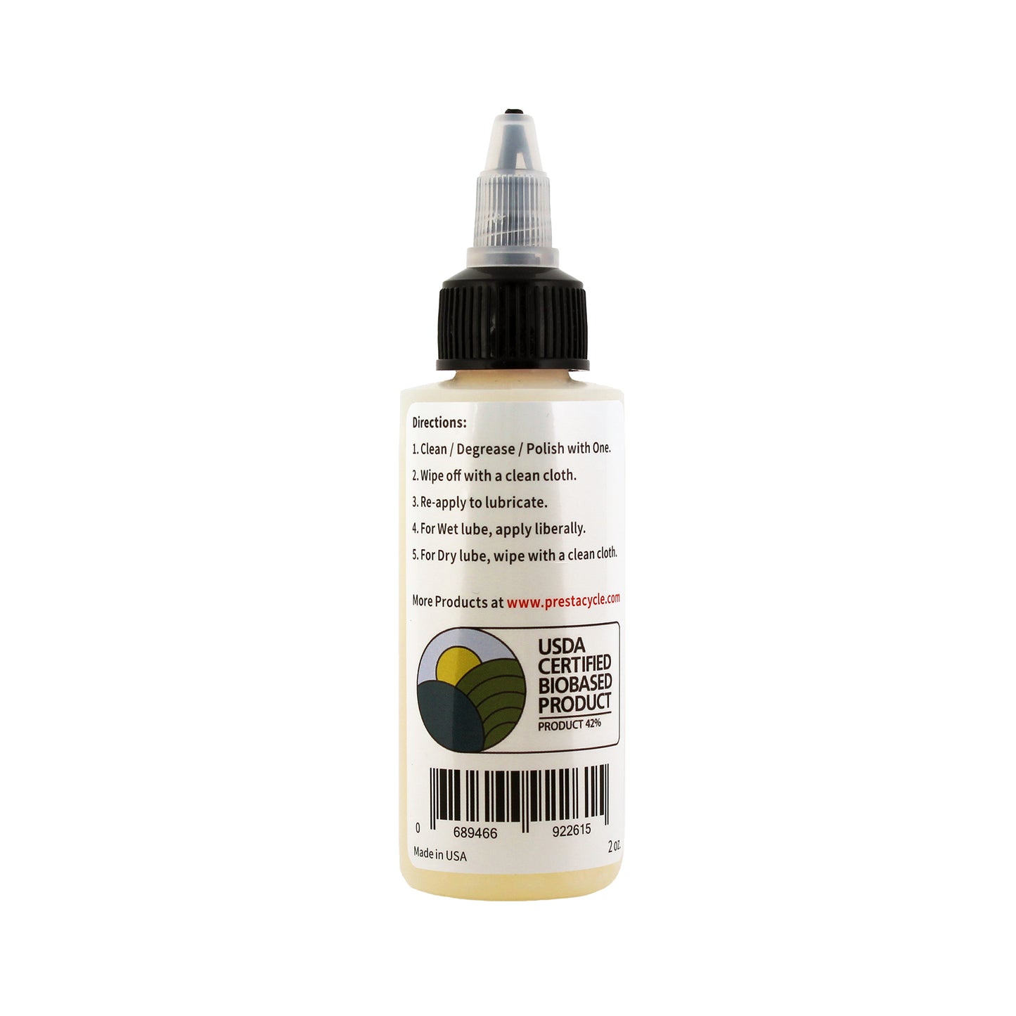 A small plastic bottle of Prestacycle One Liquid by Prestacycle features a pointed nozzle, usage directions, ASTM testing details, and a USDA Certified Biobased Product logo. It contains lubricant for cleaning, polishing, and lubricating.