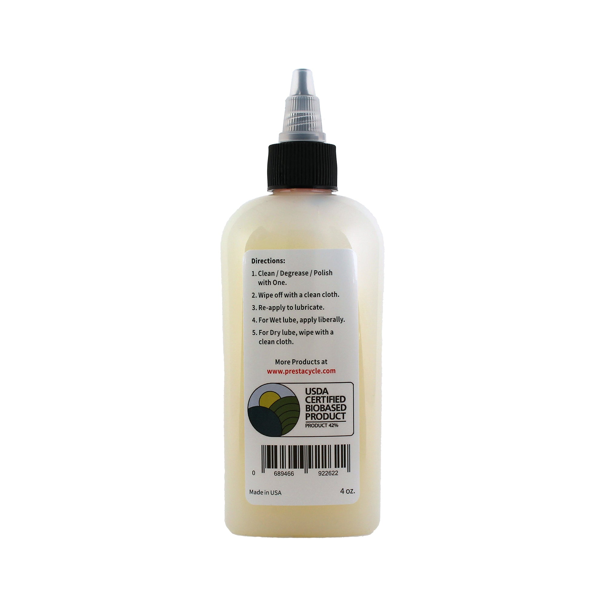 A 4 oz. squeeze bottle of Prestacycle One Liquid lubricant by Prestacycle, featuring a black cap, usage directions, and USDA Certified Bio-Based seal, tested to ASTM standards and shown against a white background.