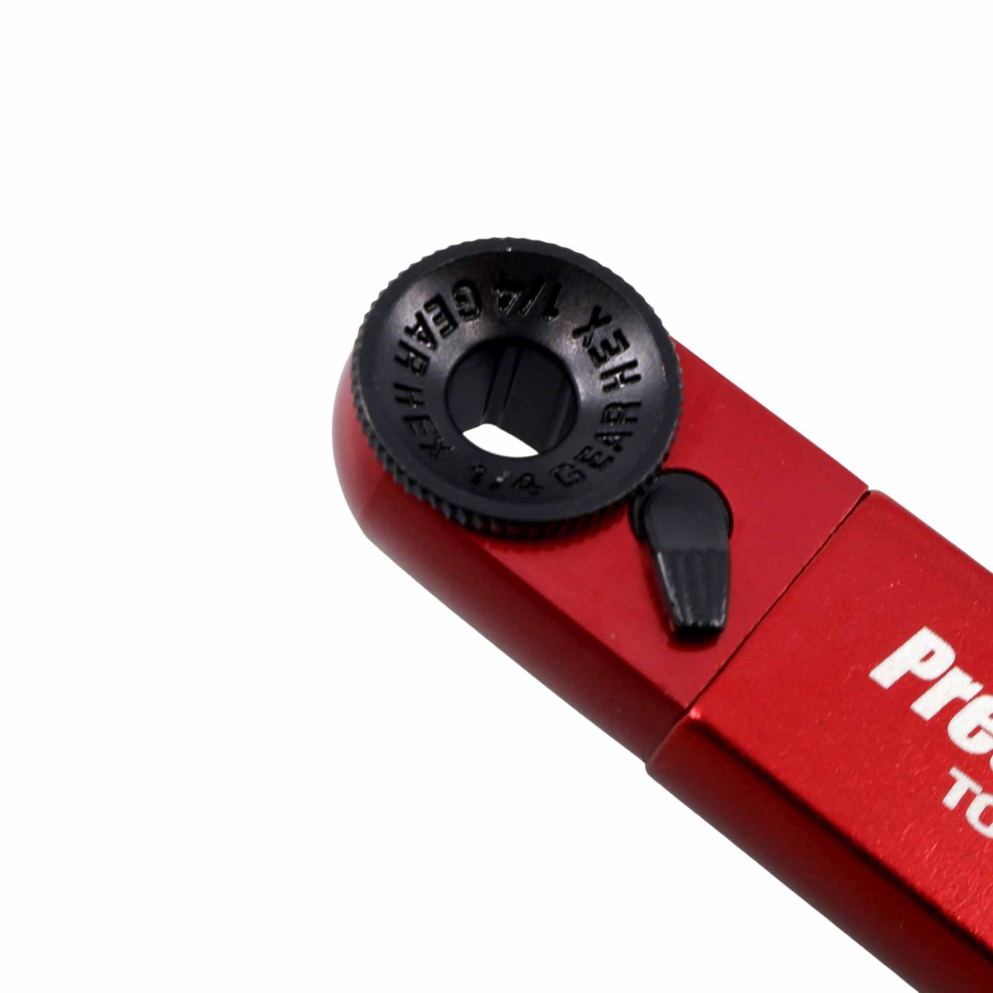 Close-up of the Prestacycle TorqRatchet ELITE Lite, a red portable hand tool with a black rotating ratchet head (1/4 GEAR HEX), small black lever, and partially visible Prestacycle branding in white.