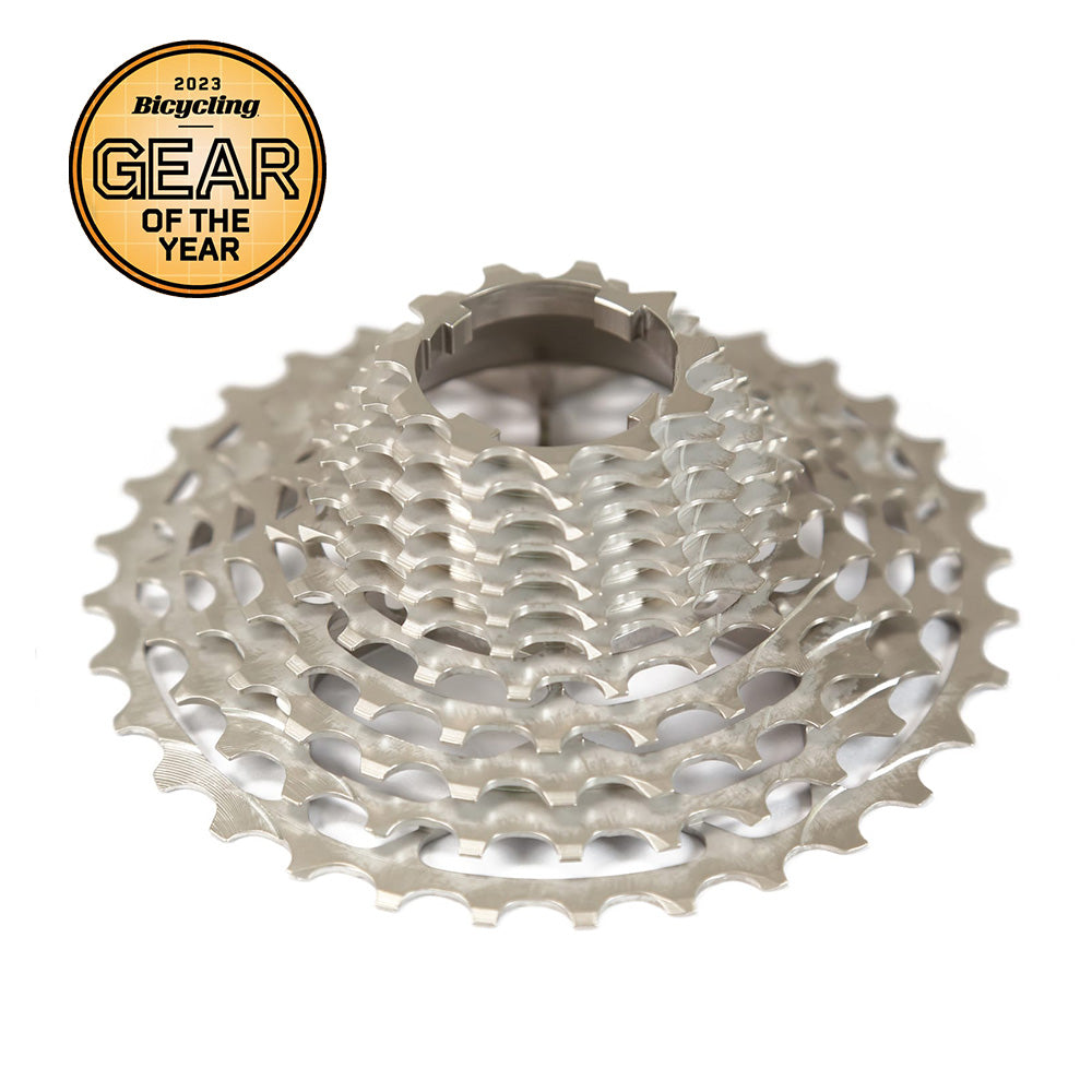 The Prestacycle UniBlock PRO Cassette (12 Speed) for Campagnolo is shown on a white background, with a gold 2023 Bicycling Gear of the Year badge in the top left corner.