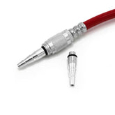 A metal quick-connect air hose fitting attached to a red hose with a Prestacycle Prestaflator Digital Bicycle Tire Inflator – Presta & Schrader Air Compressor Tool and matching connector beside it, all on a white background.