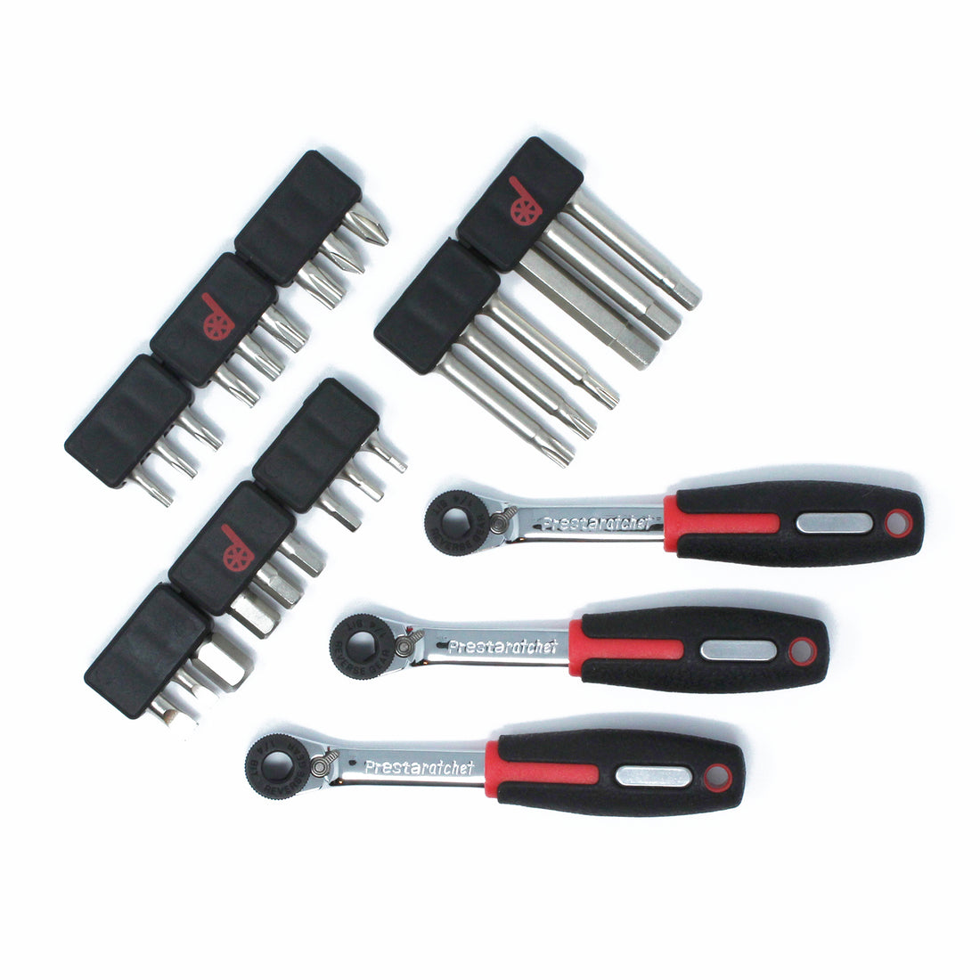 The Prestacycle Prestaratchet Pro is a mini ratchet bicycle tool workshop set featuring three small wrenches with black and red handles and multiple metal bits in black holders—perfect as a compact bike repair solution.