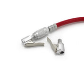 A red air hose with a metal quick connect fitting and a separate silver lever-style air chuck, both compatible with the Prestacycle Prestaflator Digital Bicycle Tire Inflator—Presta & Schrader Air Compressor Tool, shown on a white background.