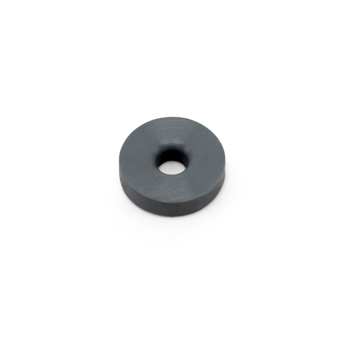 The Prestacycle Prestaflator Mini Presta Head Gasket is a small, flat, round black disc with a center hole, shown on a white background. This component ensures Presta valve compatibility for the Prestaflator MINI.
