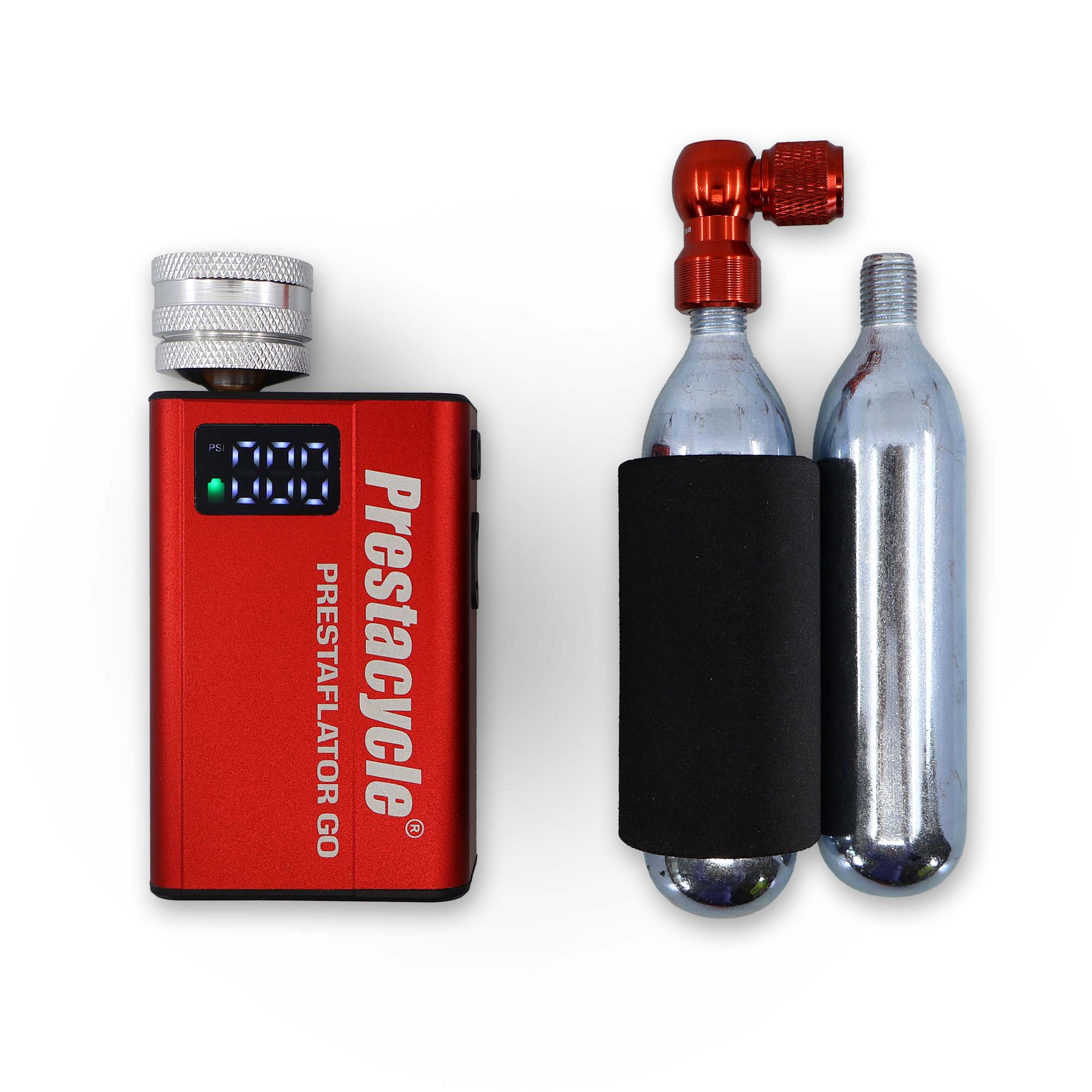 A Prestacycle Prestaflator GO Portable Digital Rechargeable Preset Bicycle Tire Inflator is shown beside two CO2 cartridges—one attached to a red inflator head—both secured with a black foam sleeve.