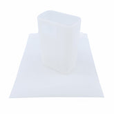 A white Prestaflator GO Silicone Case by Prestacycle, designed as a reusable rectangular accessory, stands upright on a similar silicone pouch—both custom-fit cases for protecting your kitchen or cycling essentials.