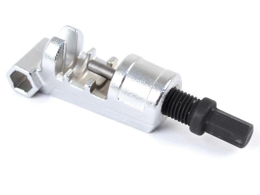 The Prestacycle PrestaRatchet Chain Accessory is a compact, portable tool with a silver body and black handle, ideal for removing or installing bicycle or motorcycle chain pins.