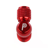 The Prestacycle Prestaflator Micro Bundle features a red metal valve cap with textured grip and a white tire and pump icon, compatible with Presta Schrader systems, shown on a white background.