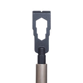 A close-up of the Prestacycle Mini Pry Bar Specialty Bit by Prestacycle, a black metal tool with a geometric cutout and metallic handle, highlights its portability and functionality against a white background.