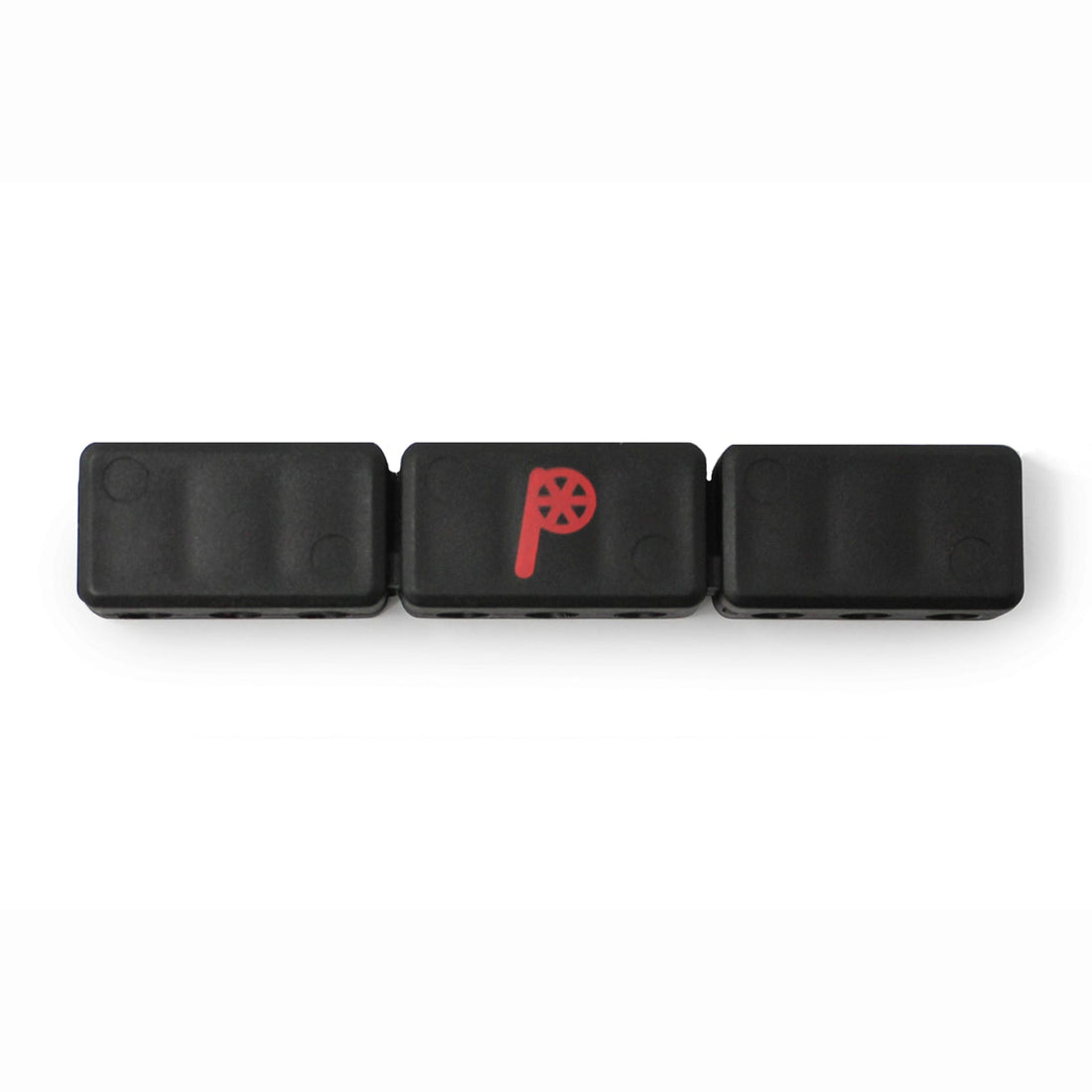 Three black rectangular blocks are arranged in a row. The middle block, the Prestacycle 9 Bits Holder by Prestacycle, displays a red P with a wheel design. All three sit against a white background.