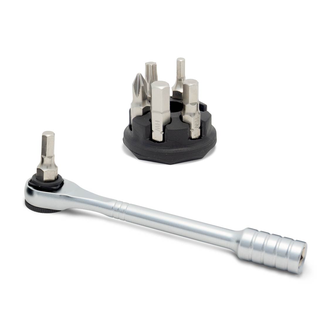 The Prestacycle Prestaratchet Micro Kit includes a silver micro ratchet wrench, a round black holder stand, and six S2 interchangeable bits of various shapes and sizes, all shown on a white background.