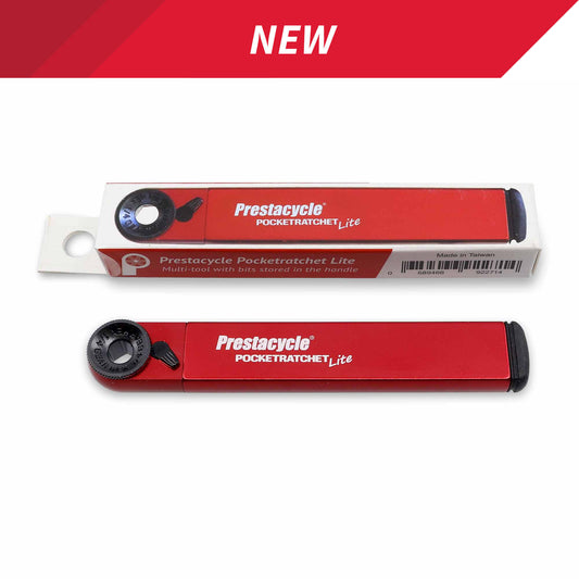 A NEW label appears above a red Prestacycle PocketRatchet Lite - Pocket Multi-tool w/Bits stored in handle, shown next to its branded packaging. The slim, rectangular tool features a rotating ratchet mechanism.