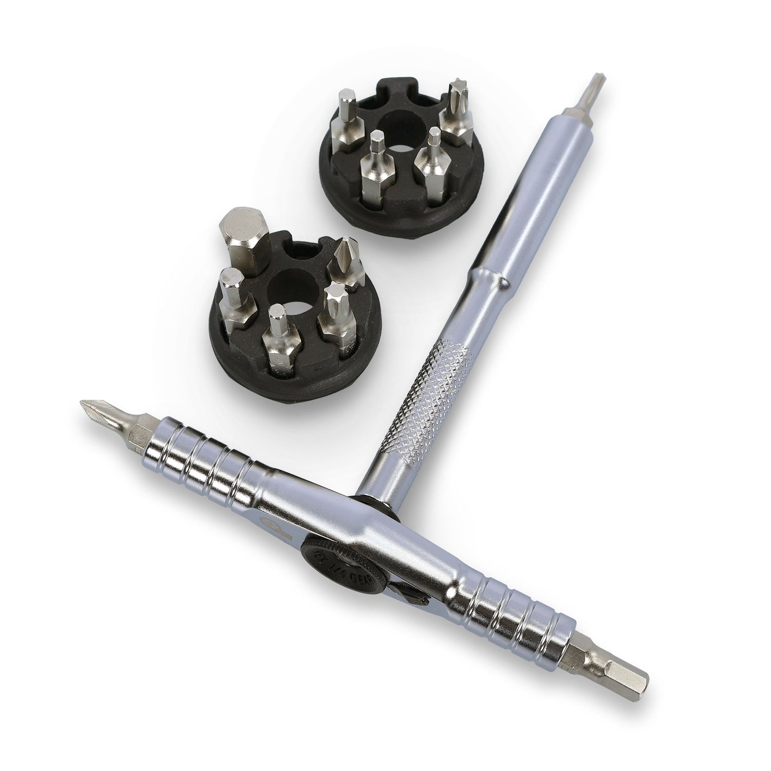 The Prestacycle T-Ratchet Pro Set by Prestacycle is a metal T-handle ratchet screwdriver with two round interchangeable bit holders, each containing various 1/4 inch bits, shown on a white background.