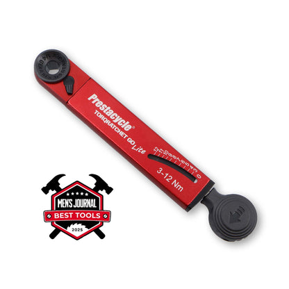 A red Prestacycle TorqRatchet GO Lite 3–12Nm portable multi-tool ratchet is shown above a Mens Journal Best Tools 2025 badge with two crossed hammers.