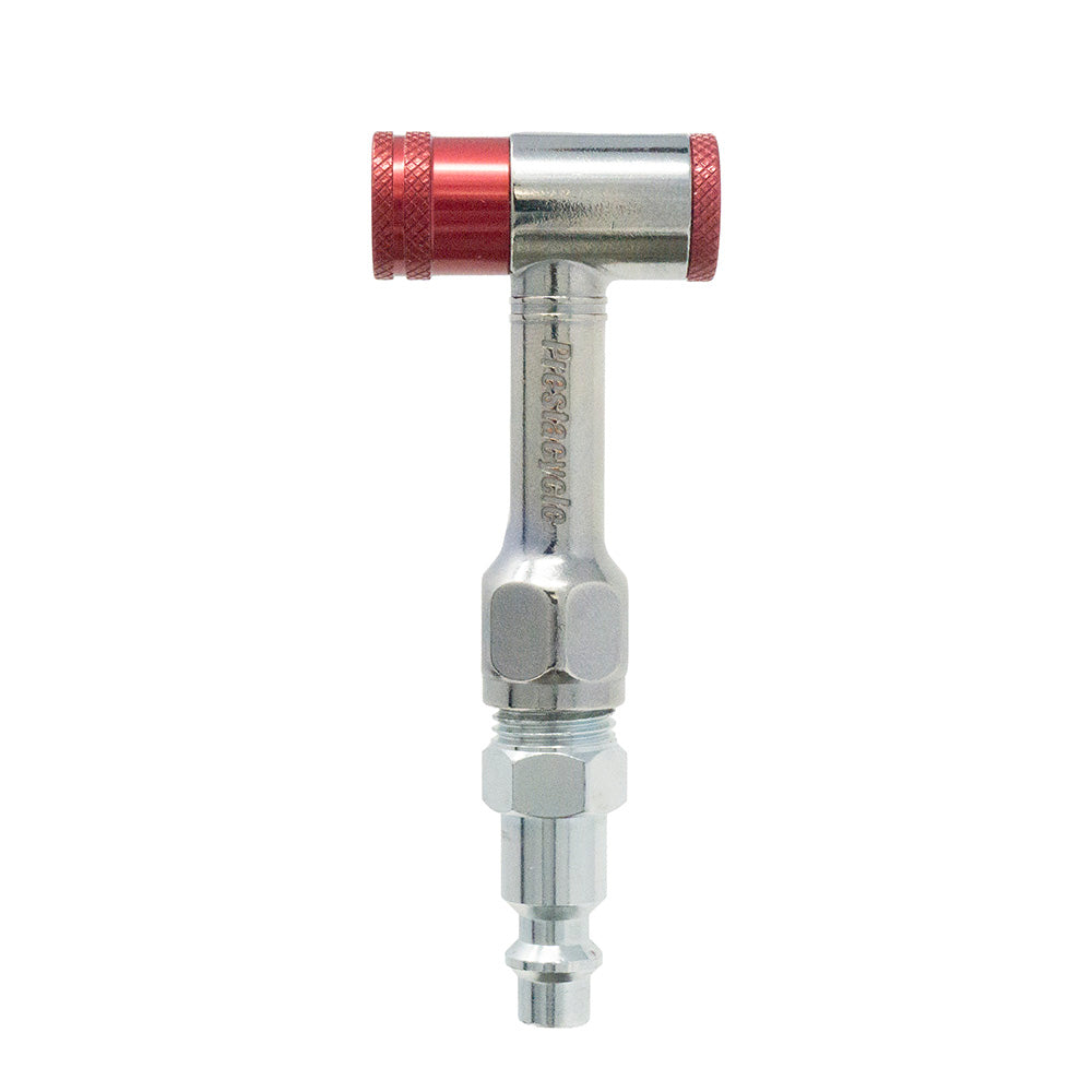 The Prestacycle Prestaflator Mini Pro is a metal air chuck tire inflator with a red right-angle head and silver cylindrical body, designed for Presta and Schrader bike valves. Ideal for push-to-inflate use, it stands upright against a white background.