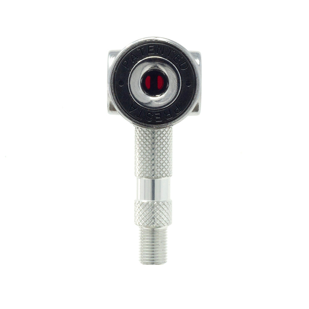 A close-up of the Prestacycle Pro Presta Head by Prestacycle, showing its metallic body with textured grip, threaded end, circular head with an auto-lock mechanism, and a central red indicator.