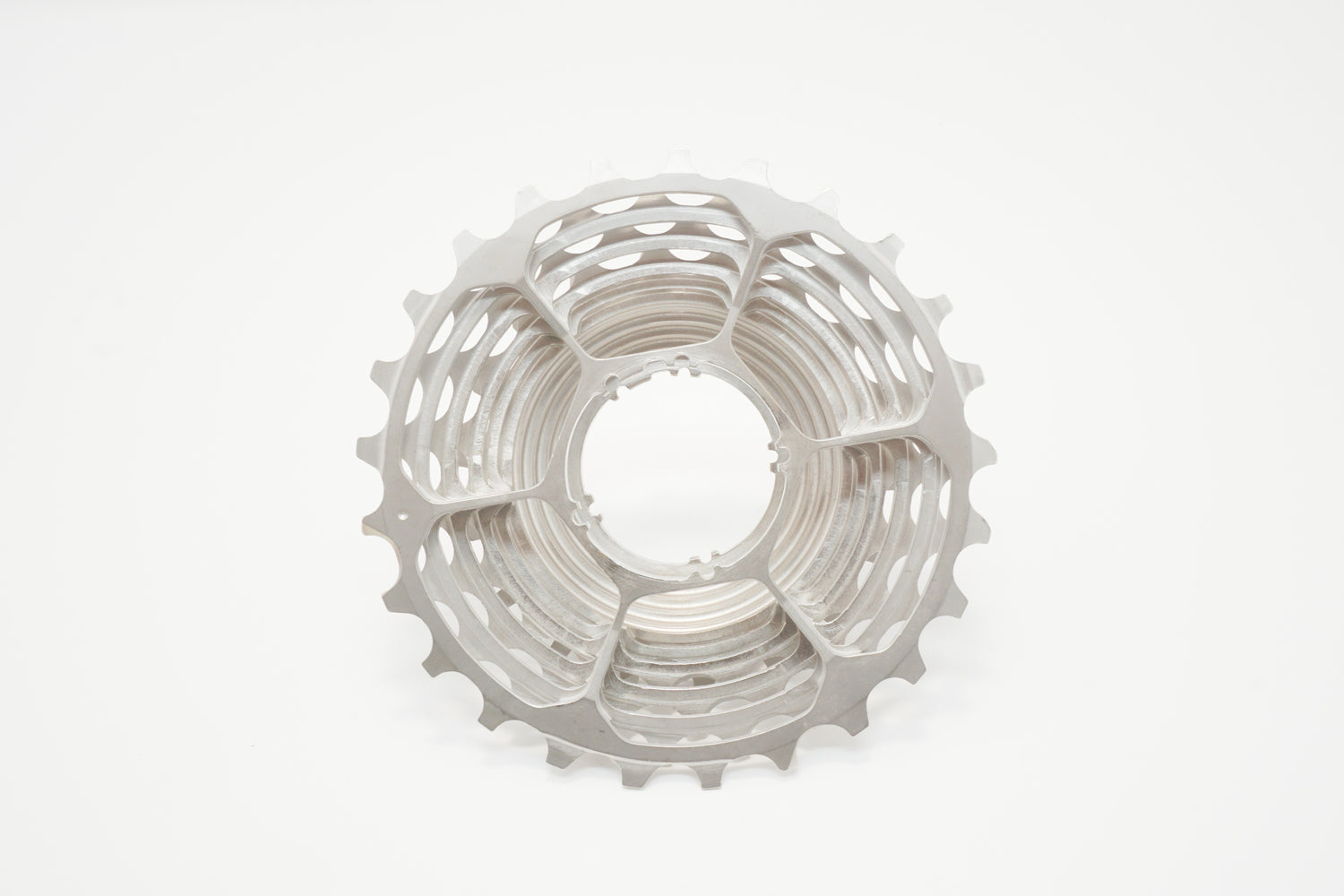 A close-up of the Prestacycle UniBlock PRO Cassette (11 Speed) for Campagnolo, featuring multiple sprockets and circular cutouts in durable Chrome Molybdenum Steel, displayed on a plain white background.