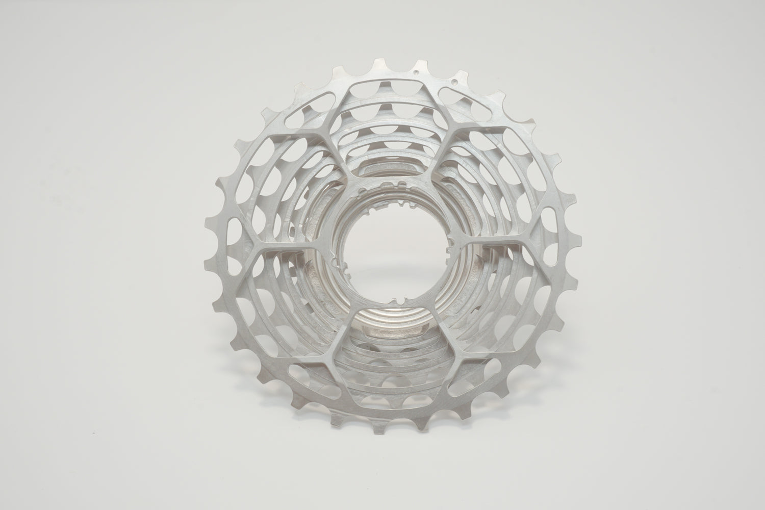 Close-up, front-facing view of a Prestacycle UniBlock PRO Cassette (11 Speed) for Shimano, featuring multiple sprockets made from durable Chrome Molybdenum steel, shown on a plain white background.